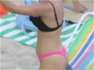 pink bikini inexperienced bare-chested voyeur Beach chicks